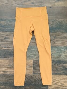 Athleta Womens Stash Pocket Salutation Tights Leggings, Orange, Size Medium